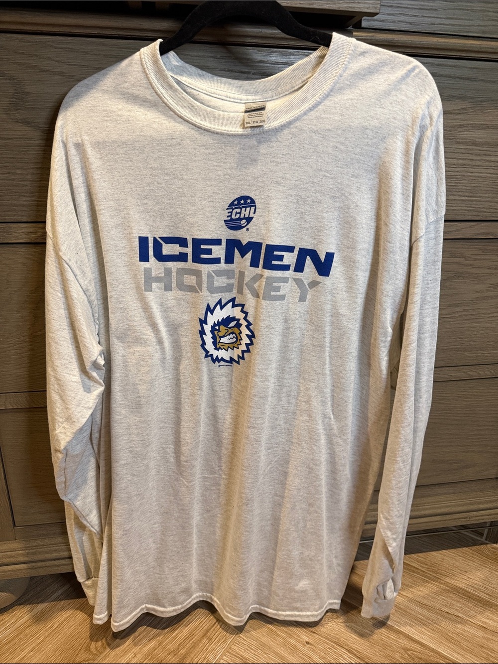 Gildan White Long Sleeve Icemen Hockey Tee with Blue and Gray Graphics